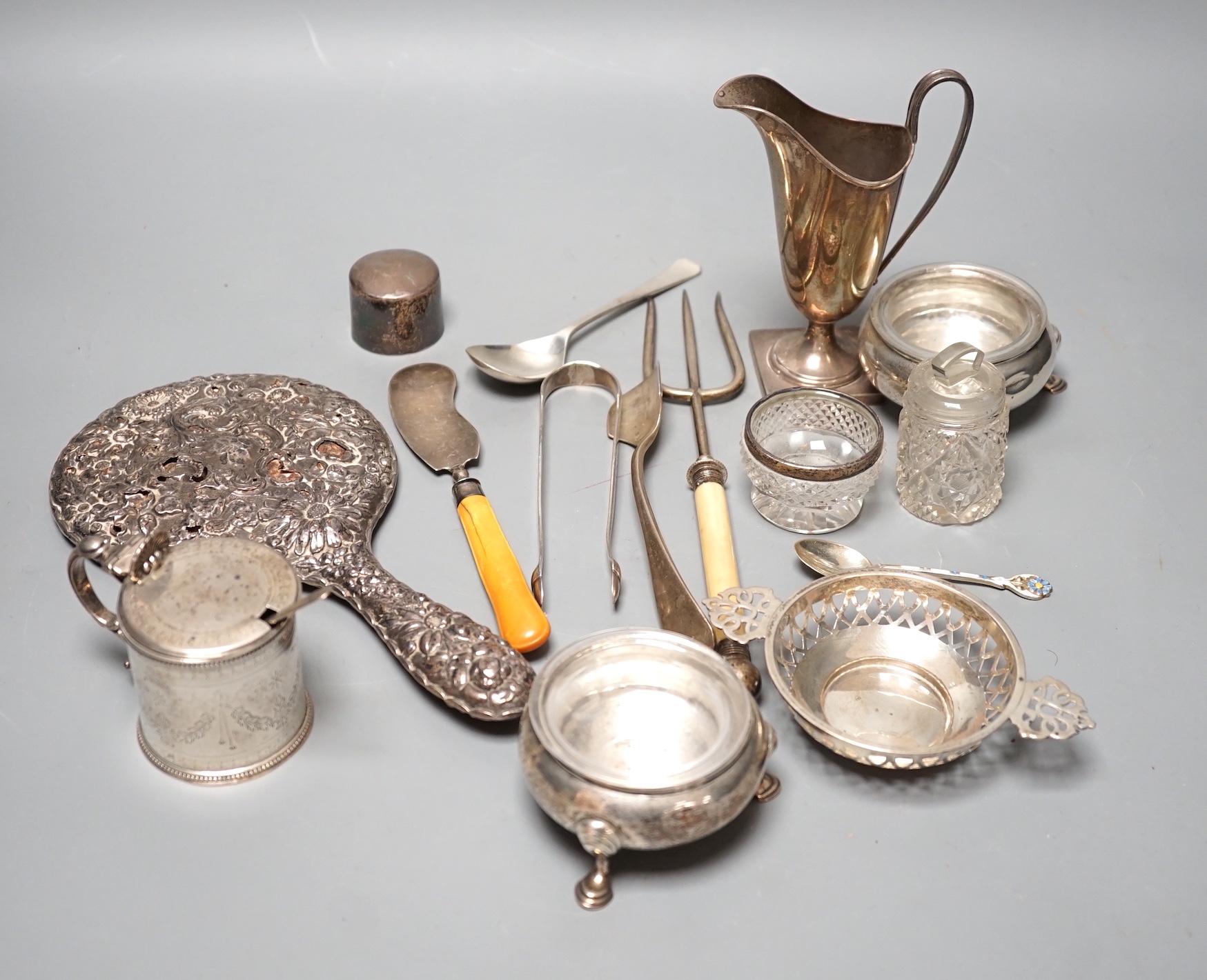 A collection of sundry small silver including a Victorian mustard, flatware including cased sets, cream jug, pair of Georgian salts, salts bottle, etc.